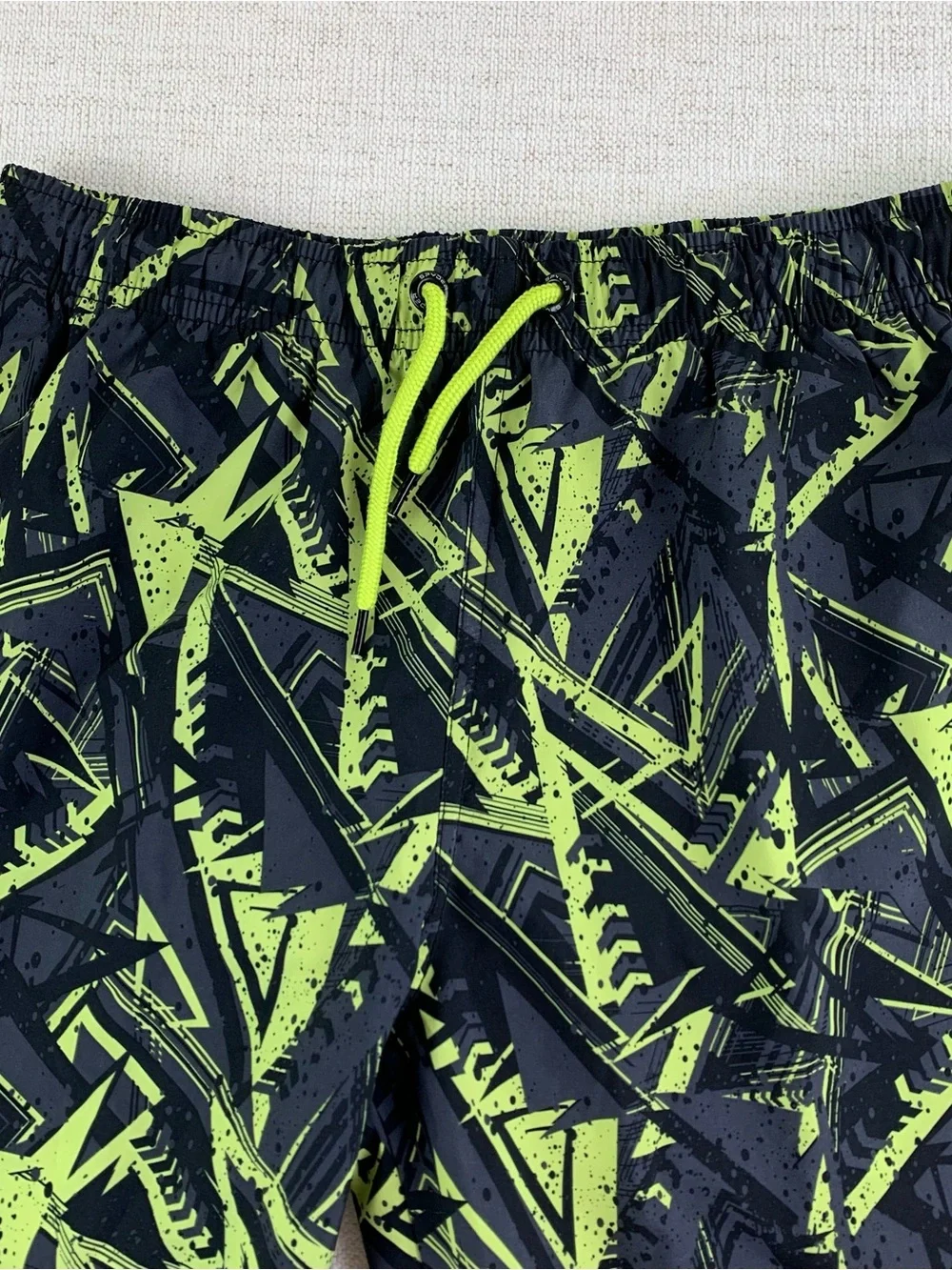 Spyder boy's Black and Neon Green Geometric print Swim Trunks size M(10-12)